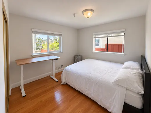 Unit 2332: another room, full-size bed and standing desk